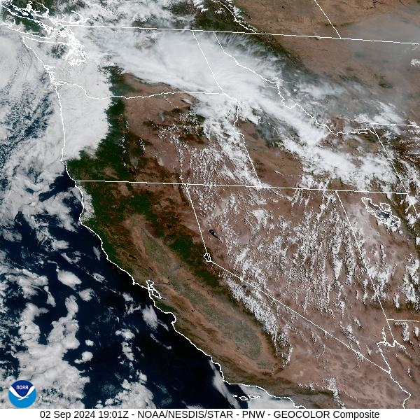 Monday afternoon’s satellite shows areas of heavy smoke over Western Montana as a trough of low pressure provides clouds and showers.